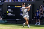 Alcaraz in action at The Championships - Wimbledon 2025. - Source: Getty